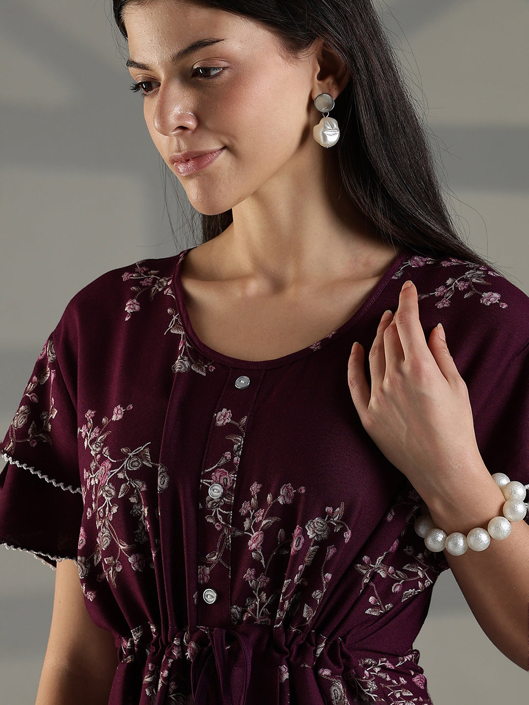 Comfortable floral frock type nighty for women in wine.