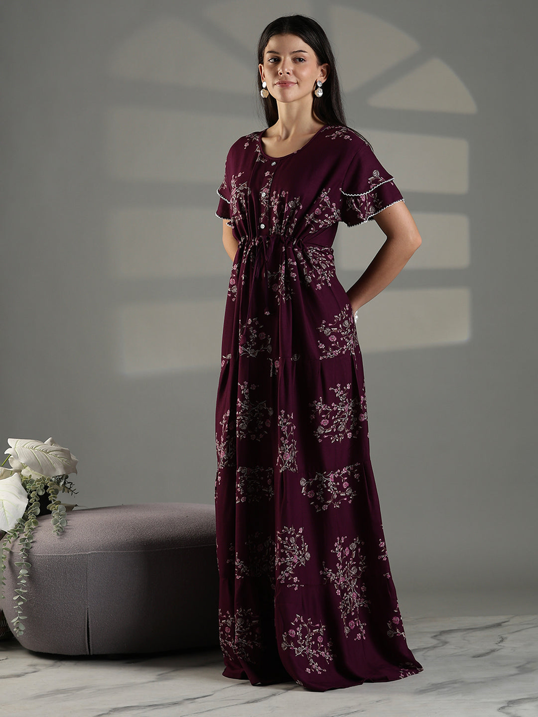 Comfortable floral frock type nighty for women in wine.
