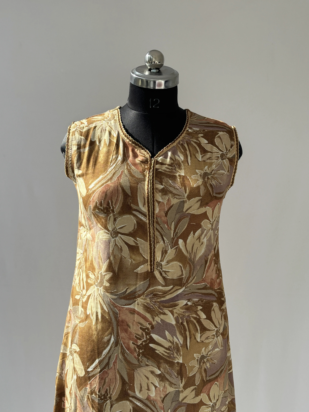Elegant and premium yellow alpine nightydress for women in a fresh floral print.
